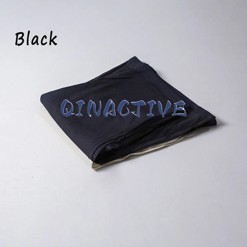 QINACTIVE Women’s Flared Fitness Pants